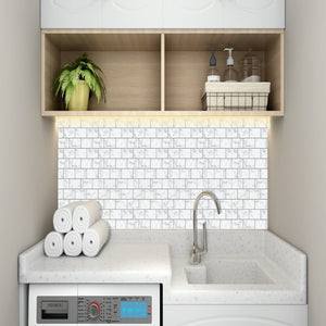 marble subway peel and stick tiles in the laundry as splashback