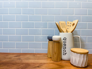 soft blue subway stick on tiles to create a hamptons kitchen