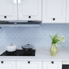 Load image into Gallery viewer, soft blue subway stick on tiles against an all white kitchen
