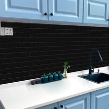 Load image into Gallery viewer, black self adhesive tile with black grout in kitchen as backsplash
