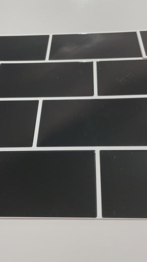 black self adhesive tile with white grout