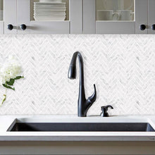 Load image into Gallery viewer, premium marble herringbone stick on splashback in the kitchen by Stick on luxury
